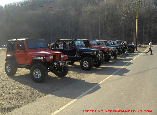 Club Jeep at the pay shack...   Stephen doing his best impersonation of Sasquatch